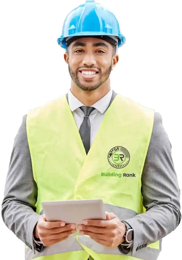 Civil engineer with Building Rank logo on his helmet standing in confidence with crossed hands and looking right to the camera